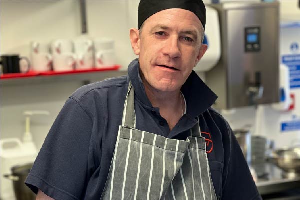 Volunteer chef supporting homeless people